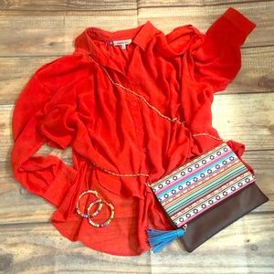 Jennifer Lopez sheer cold shoulder blouse